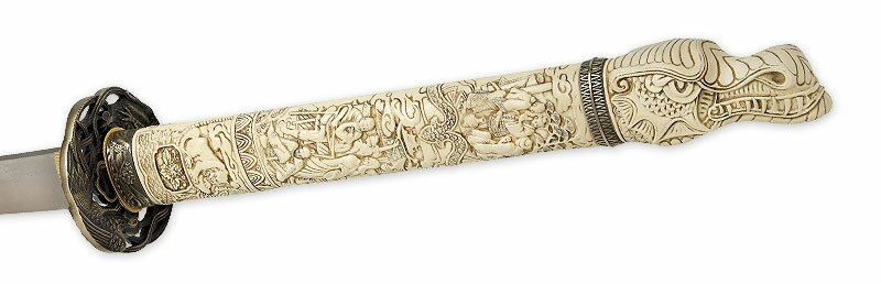 Detailed faux ivory handle